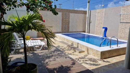 CASA de PRAIA NO FRANCÊS 3 QUARTOS SENDO 1 SUITE