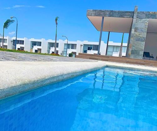 Casa Familiar a Pasos del Mar Playa y Felicidad