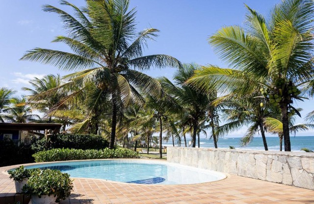 Casa pé na areia com garagem na Praia de Guarajuba