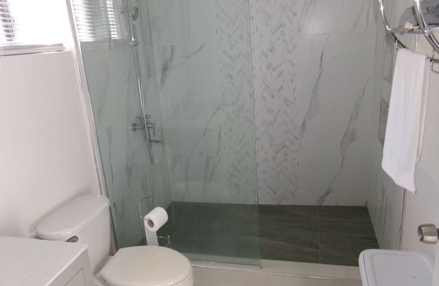 Charming 2-bedroom house in with AC, Pool, hot water, washer and dryer, gated.