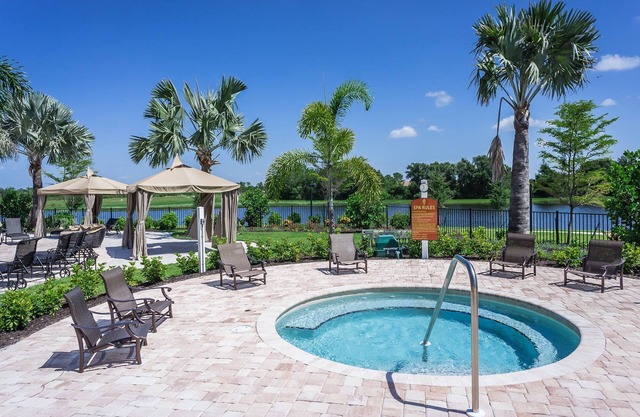 Charming 2-BR villa with resort like pool & fitness room.
