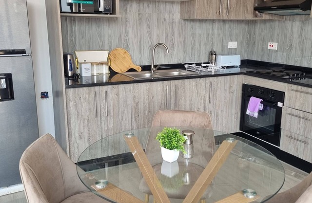 Charming 2Beds-3Baths Apt with WiFi and backup solar in Ibex Kingsland Lusaka 3
