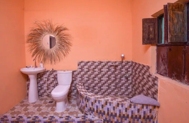 Charming 3-bedroom beach front villa with WiFi and AC in delightful Chuini