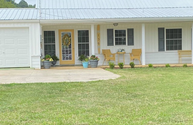 Charming lake front 2-bedroom cottage in Gray with WiFi and AC