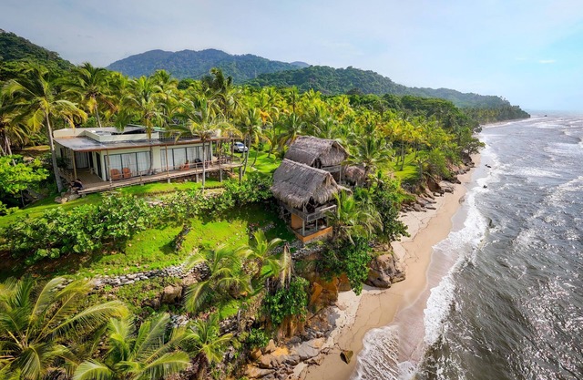 Charming oceanfront cabin with stunning views, private terrace, and beach access