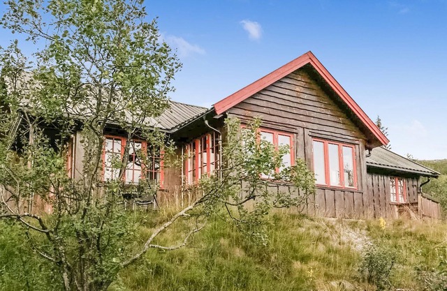 Charming wooden holiday home in idyllic location in the middle of nature.