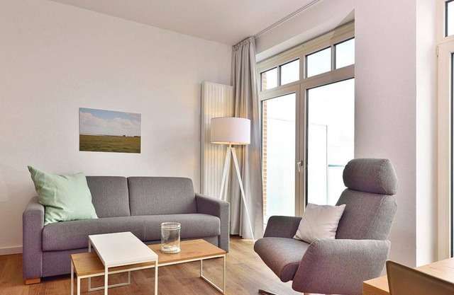 Chic apartment on the North Sea beach with top sea view, balcony and beach chair! -