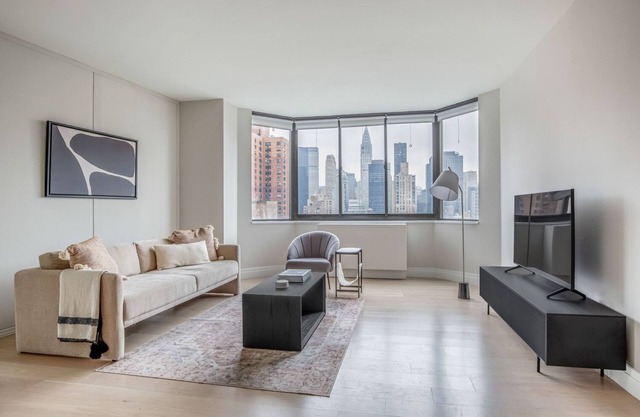 Clean Kips Bay 2BR w/Gym & Doorman, nr Comedy & Theater, by Blueground