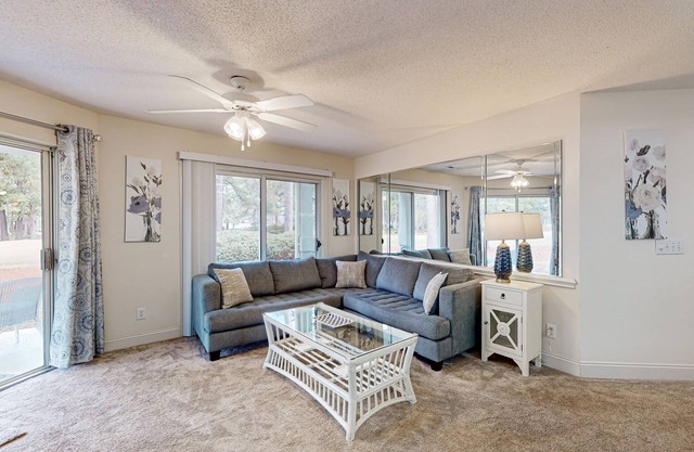 Coastal Condo with golf on-site, shared pool and fitness center
