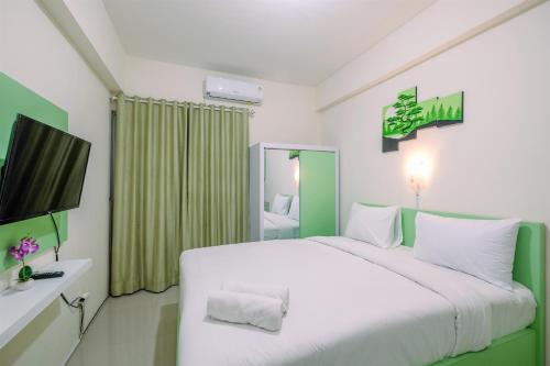 Comfortable and Minimalist Studio at Bogorienze Apartment By Travelio