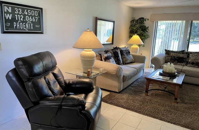 Condo right on the golf course in a 55+ community in sunny Mesa!