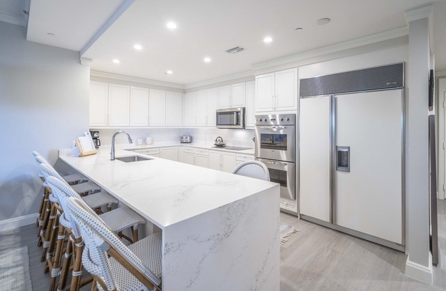Contemporary ground-floor beachside Residence located at The Ritz-Carlton