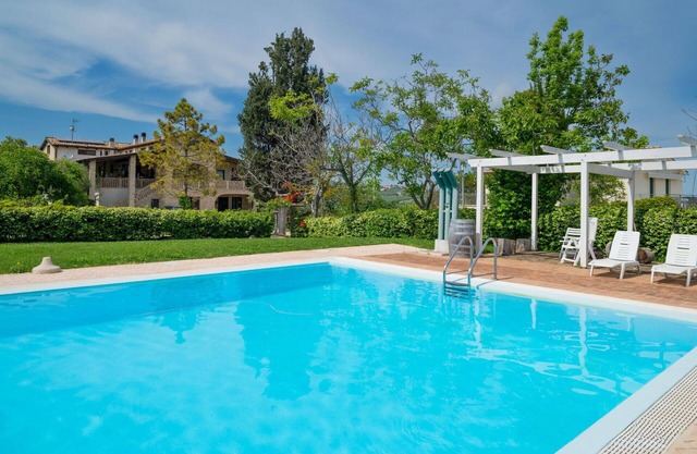 Cosy apartment for 4 guests with WIFI, pool, A/C, TV, patio, pets allowed and parking