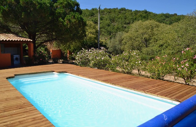 Cottage surrounded by nature between sea and mountains