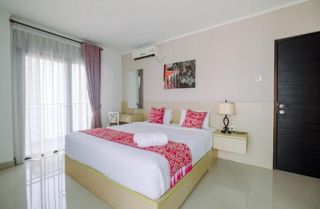 Cozy 2BR Apartment with Sofa Bed at Tamansari Semanggi By Travelio