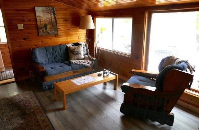 Cozy cabin with a lake front view.