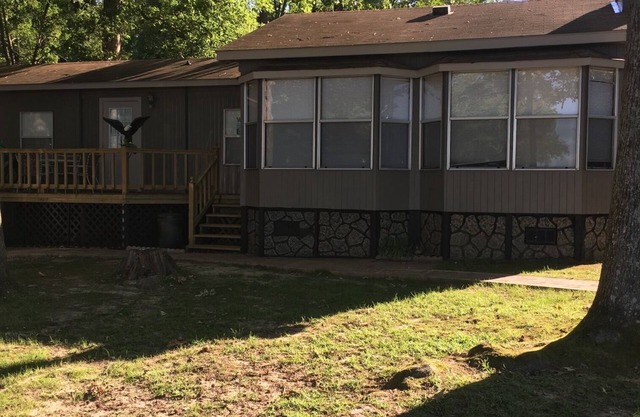 Cozy on the lake lodging with kayaking and fishing supplies furnished.