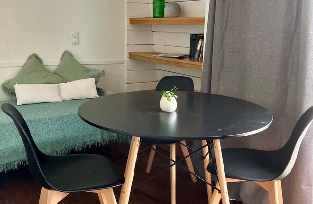 Cozy studio DUNA in La Pedrera with AC, WiFi, front deck on a garden