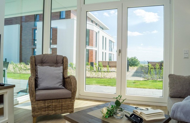 Cozy vacation apartment with sea view & terrace at Südkap A-03 in Pelzerhaken