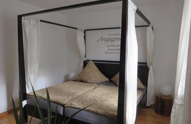 Cozy vacation apartment (80 m2) with wooden terrace and sunbathing lawn