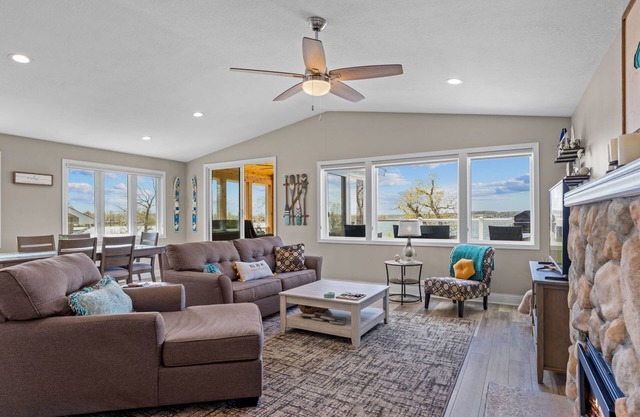 Cozy, year-round lake home with magnificent sunset views, lake access and dock.