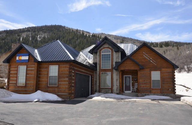 Custom log cabin nestled in Powderhorn Ski Resort. Great in winter or summer.