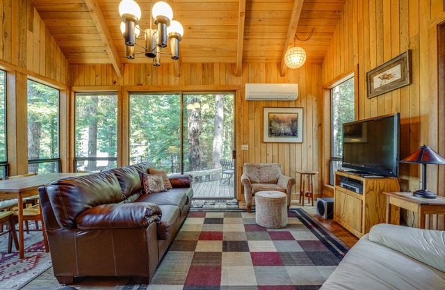 Dog-friendly cabin with deck, mountain views, pools, & hot tubs