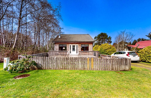 Dog-friendly home with fireplace & 3 decks - half a mile to the beach