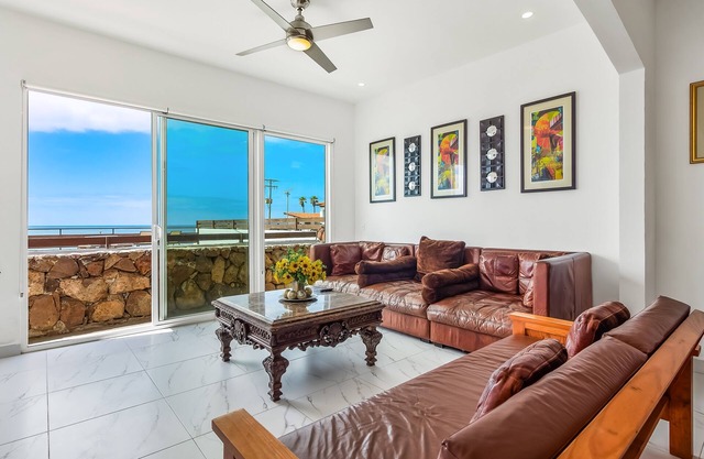 Dog-friendly home with partial ocean view, heated pool, rooftop terrace