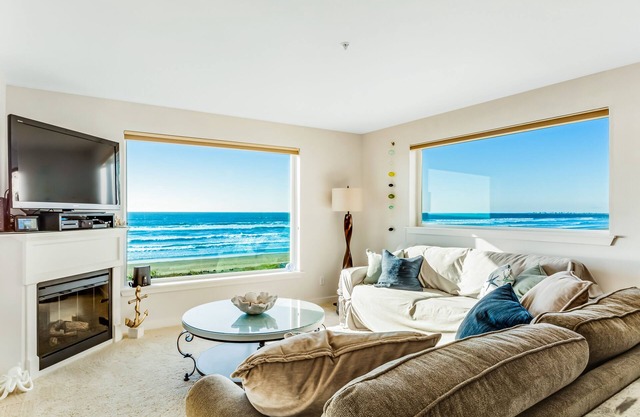 Dog-friendly oceanfront condo with beach access, fitness room, and amazing views