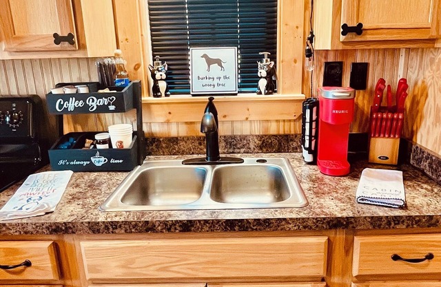Dogs Rule at the Cabin at Camp K9, but people are welcome too.