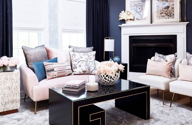 Elegant suite with a king bed, fireplace, and kitchenette.