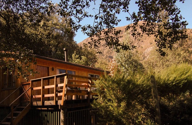 Enchanting Cabin with Deck for a Vacation in the Mountains of Cajon del Maipo