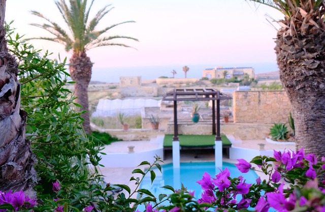 Enchanting converted farmhouse with private pool and mature garden with seaviews