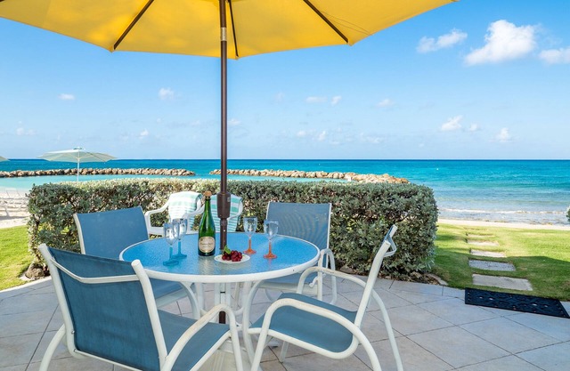 Enjoy Gorgeous Views & Sunsets Right from the Patio of this Oceanfront Unit!