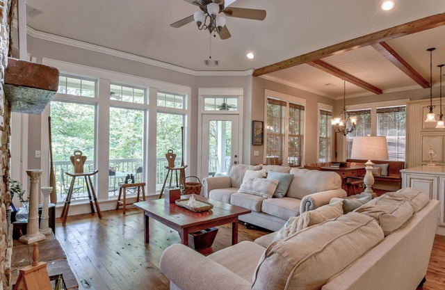 Enjoy spacious 4 bedroom home with stunning lake views and year round deep water