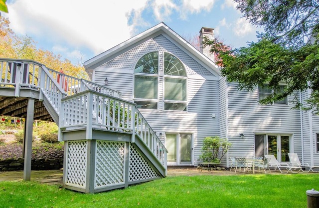 Enjoy the calming views of the woods at "Treeside" in Eagles Mere