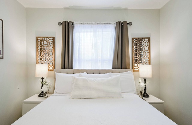 Enjoy two separate, fully furnished homes on one property — perfect for large groups. The front home offers 3 bedrooms and 1 bath, while the back two-story home features 3 bedrooms, 2 baths, and an upstairs family room with 2 beds