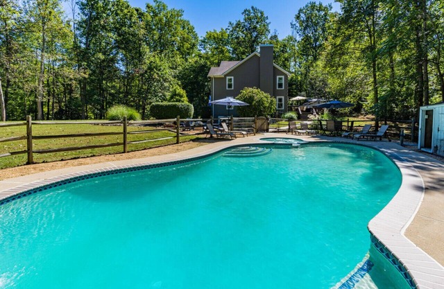 Escape the city to this Spacious and Clean 5BR/3.5BA home with a Heated Pool and Spa on 8 Acres in Horse & Wine Country
