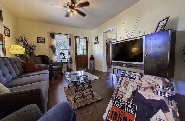 Escape to Retro Bliss: 1950s Themed Duplex with Riverfront Charm!