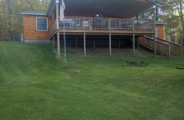 Exclusive lake front property. Nothing but the ritz. Outdoor kitchen & hot tub.