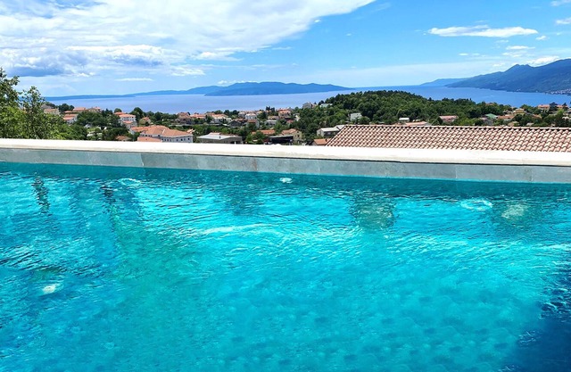 Exclusive vacation apartment near Opatija with 180° sea view and private pool.