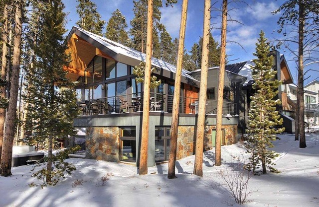 Experience the stunning Breckenridge Cloud Cabin, a spacious 4-bedroom retreat with ski area views!