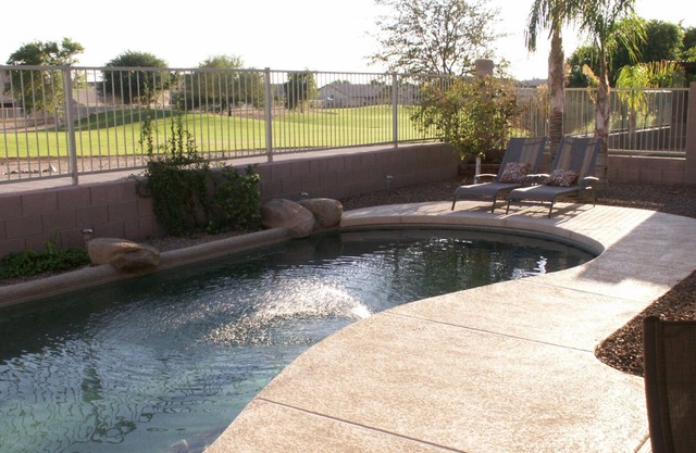 Family Friendly Home with HEATED Pool Located on a Golf Course