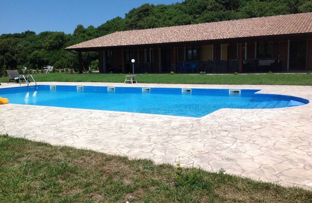 Farm holiday "Sa Raighina house center" with big shared pool