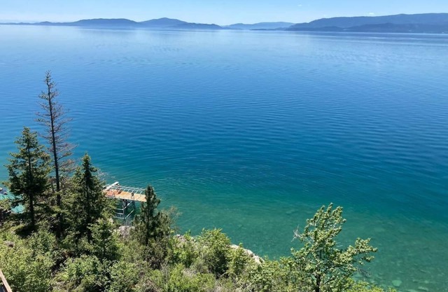 Fill your soul w/400' of PRIVATE waterfront w/dock, lift, diving board & more!
