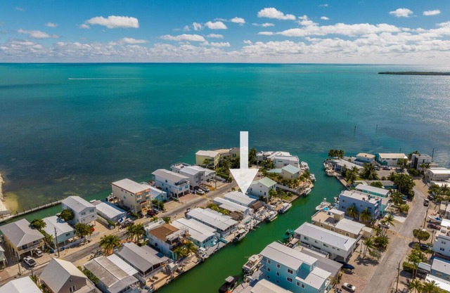 Geat Fishing & Ocean breeze, 40 ft dock for your boat with direct ocean access.