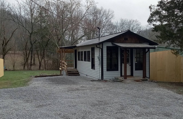 "Going postal" Historical post office turned into charming tiny home.