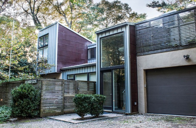 Great lakefront house w/ private beach & hot tub, quiet wooded location, views