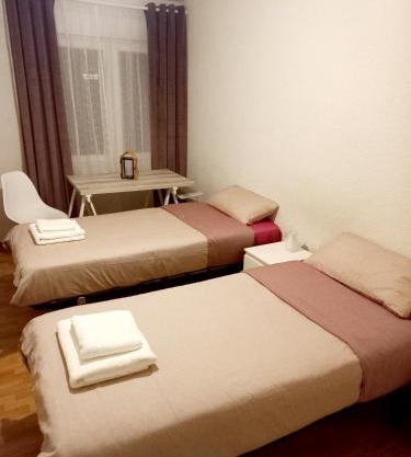 Habitación con baño compartido